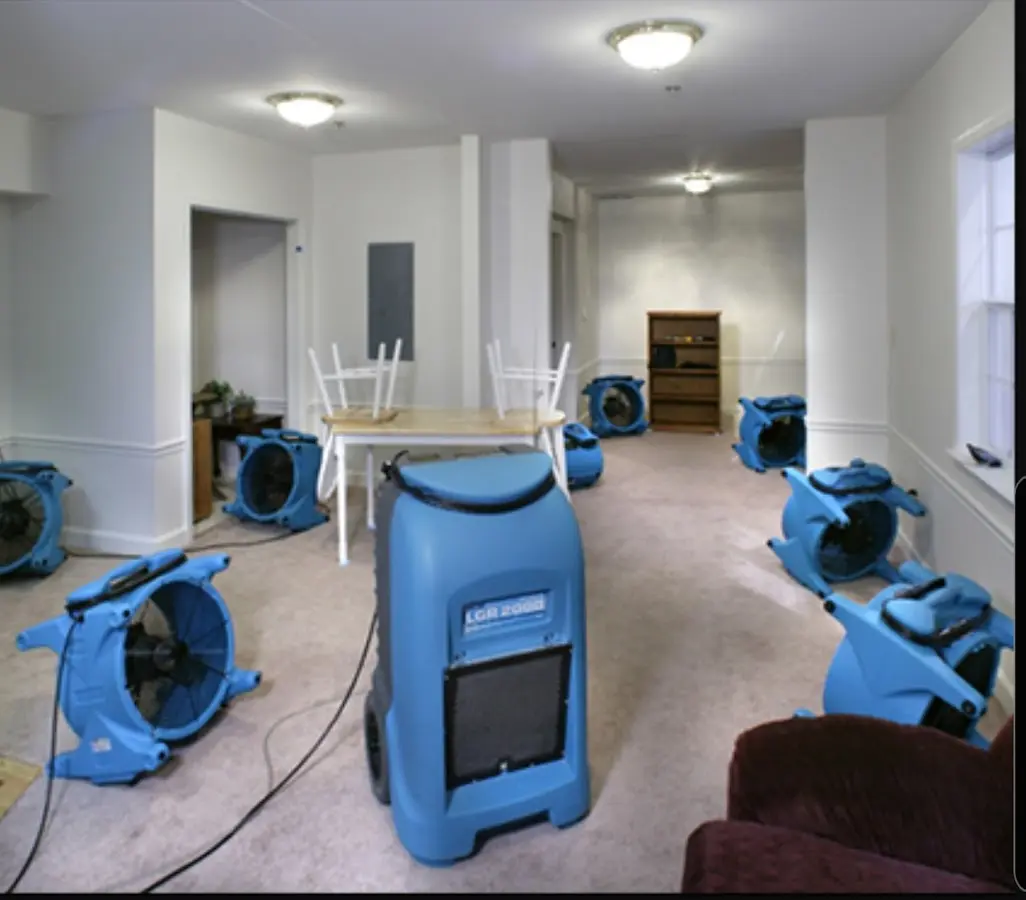 Air movers and dehumidifier setup for Water Damage Restoration in McNair